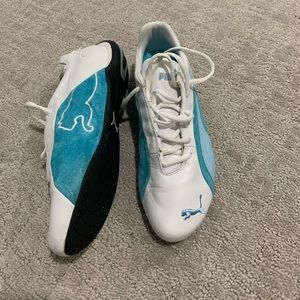 Puma turquoise and white sneakers